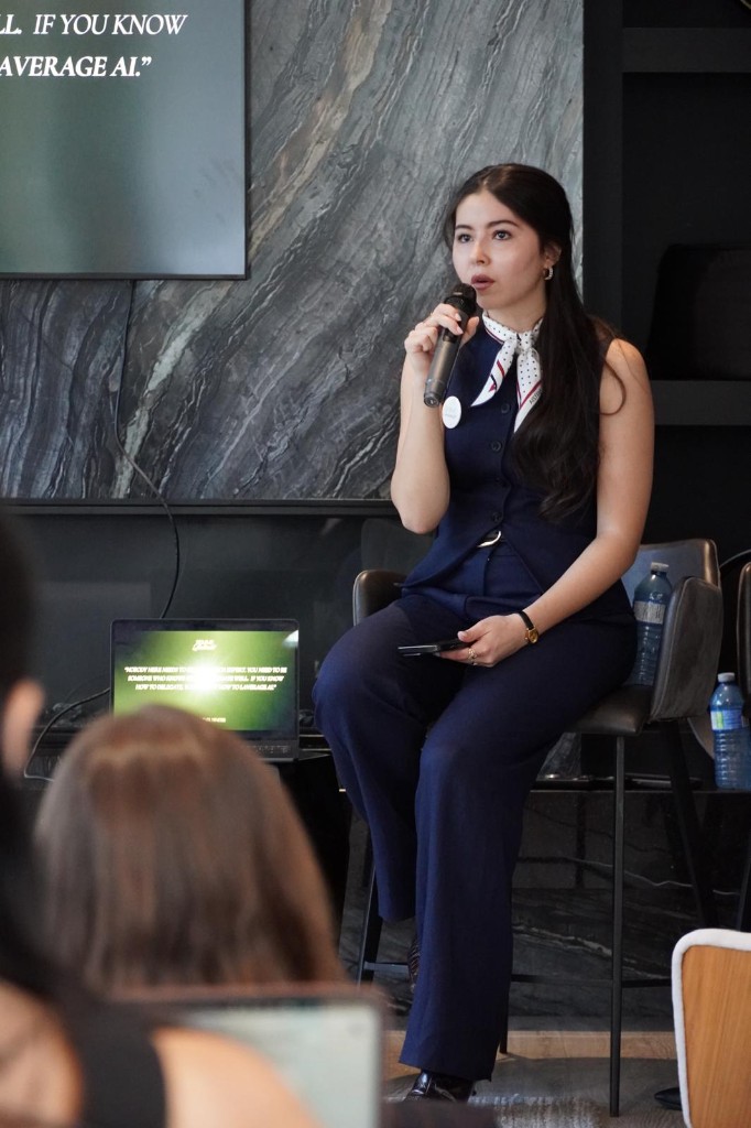 Basma speaking to the room during a LaverageAI workshop